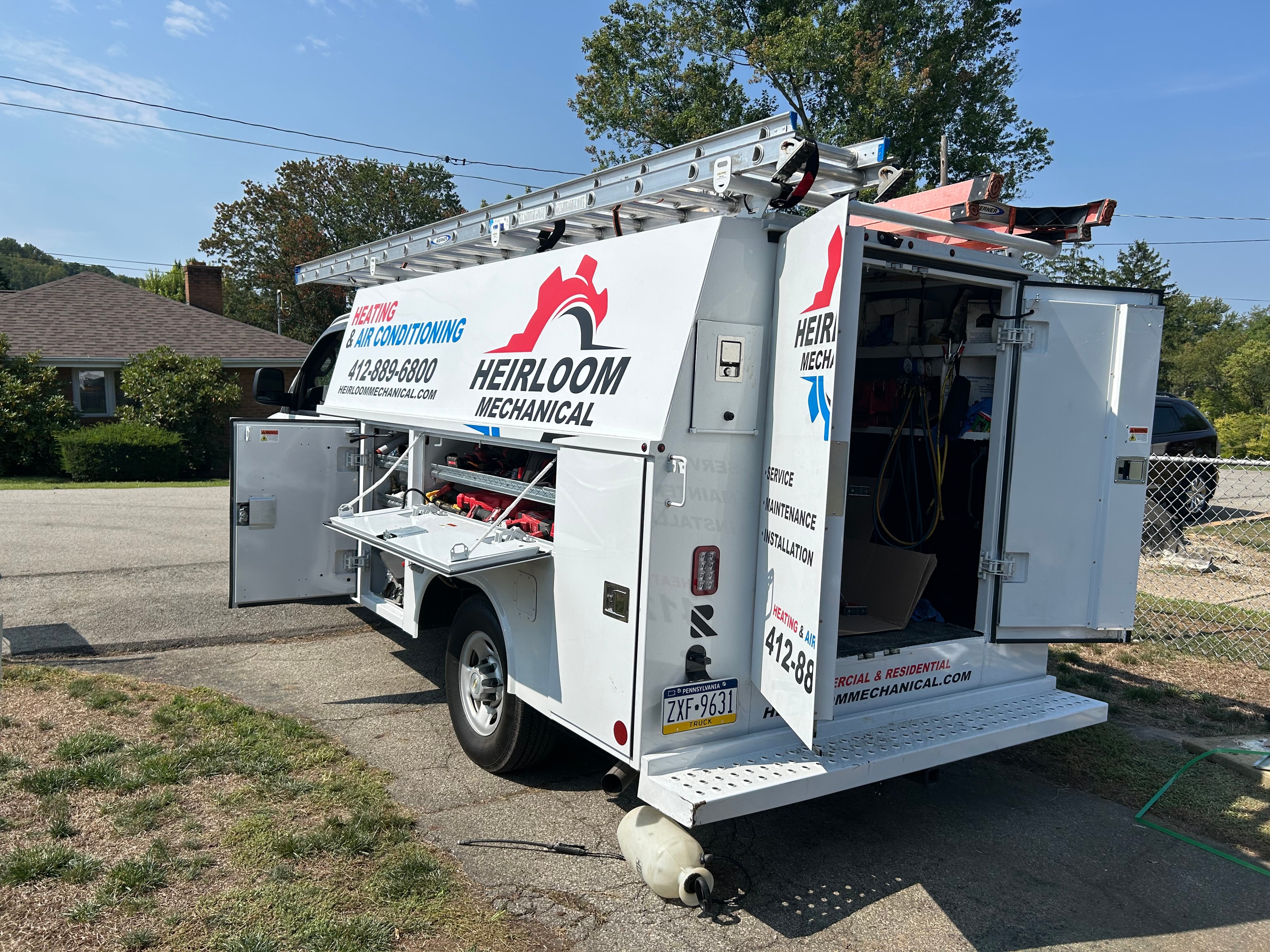 Heirloom Mechanical HVAC service van at a Connellsville, PA Trane furnace and air conditioner replacement job