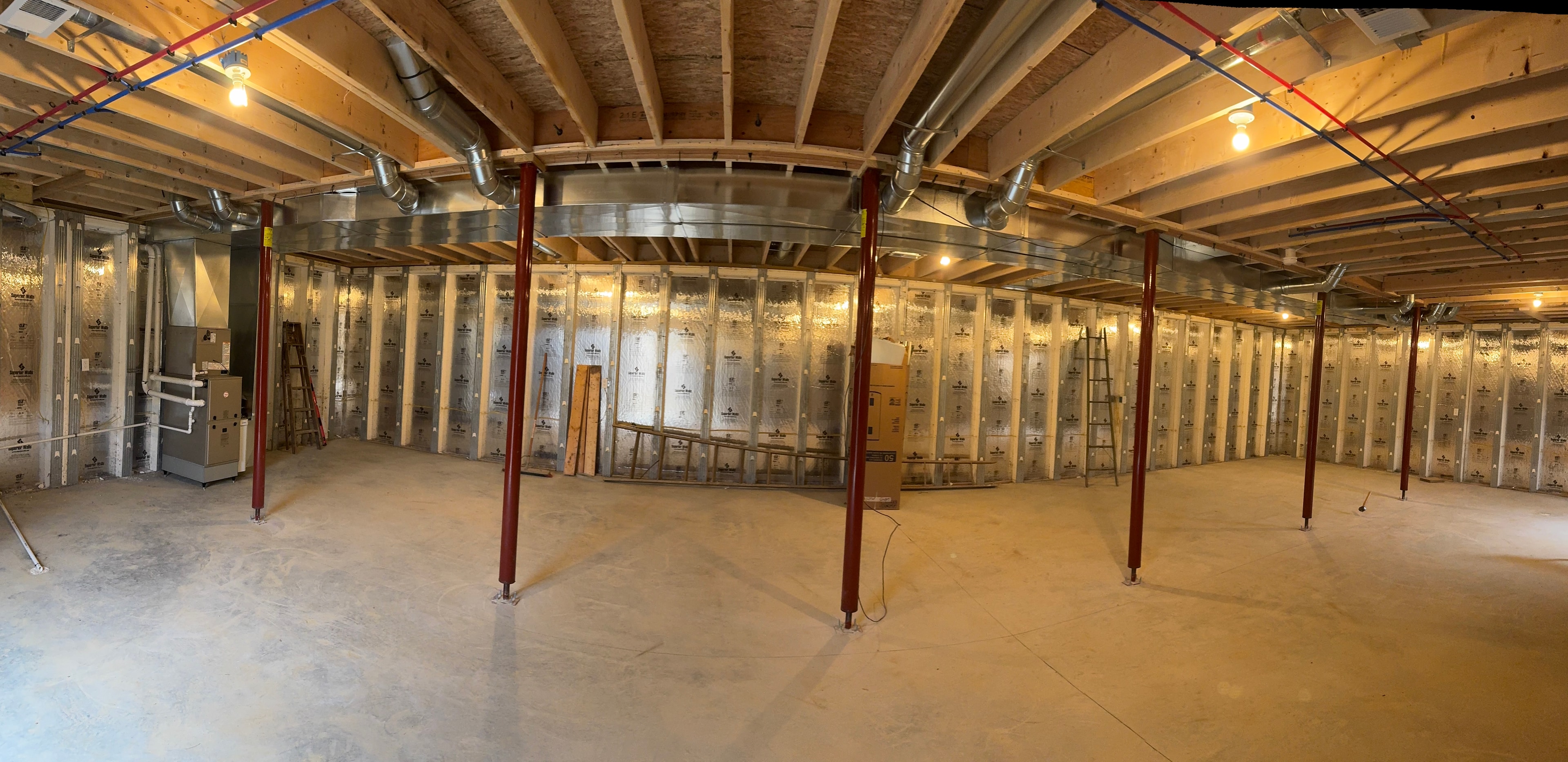 Panoramic view of completed ductwork system in new home basement near Mount Pleasant, PA