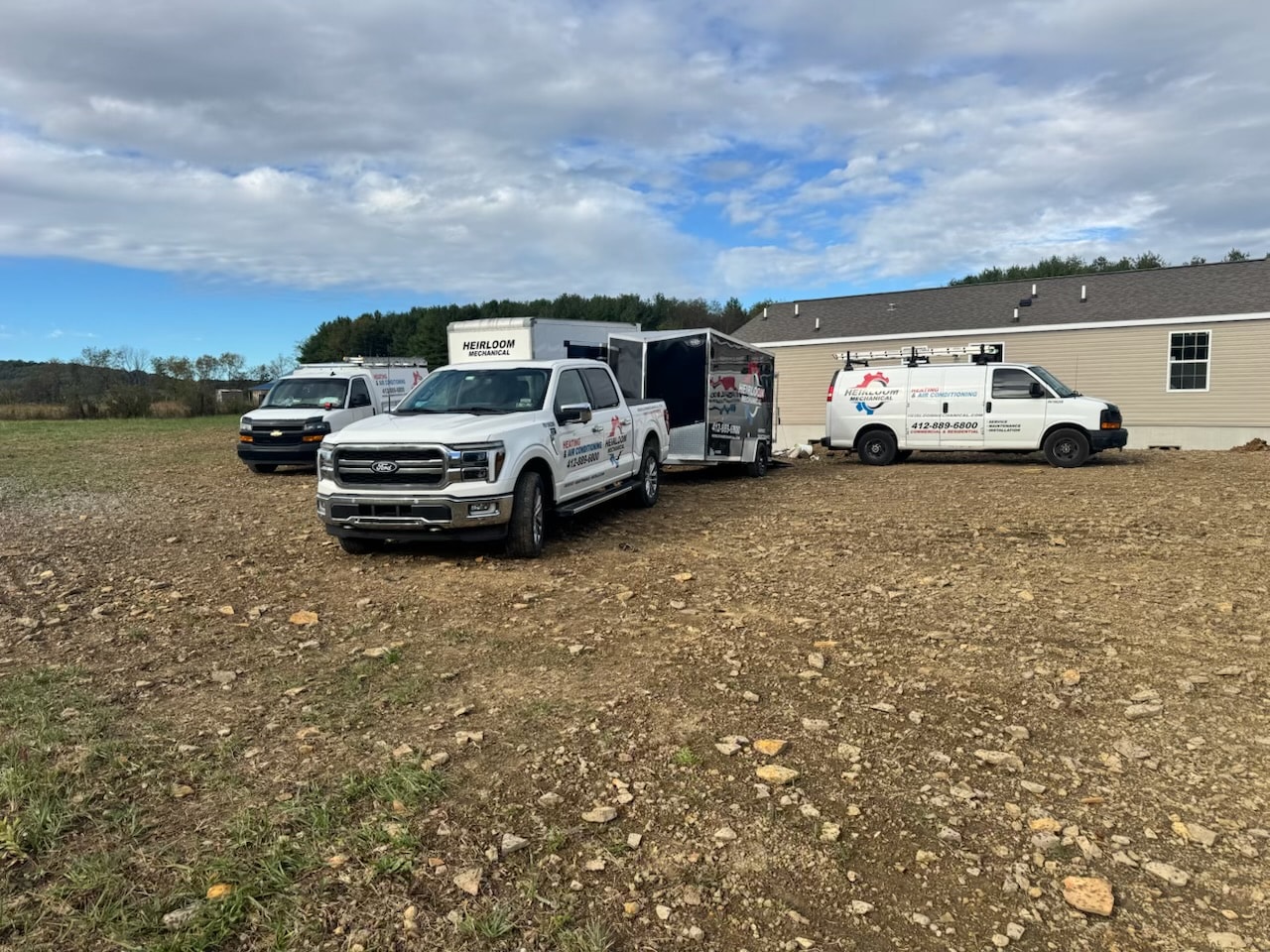 Heirloom Mechanical fleet on site at new home construction near Mount Pleasant, PA