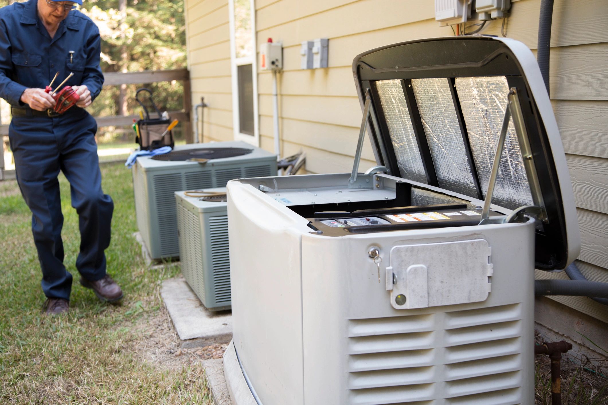 Heirloom Mechanical HVAC technician servicing residential equipment